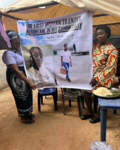 Woman Celebrates Being The First to Enter Aeroplane in Her Community